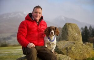 ‘Max the Miracle Dog’ Owner Kerry Irving Receives Freedom of Keswick Award max the miracle dog and kerry irving photo