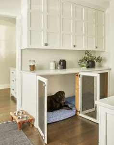 a-built-in-dog-crate-in-the-furniture-in-the-kitchen Dog Corner Ideas